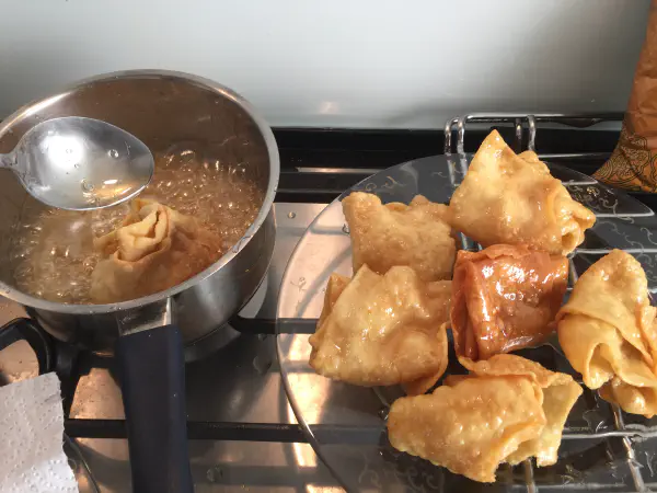 Dipping manicotti in honey