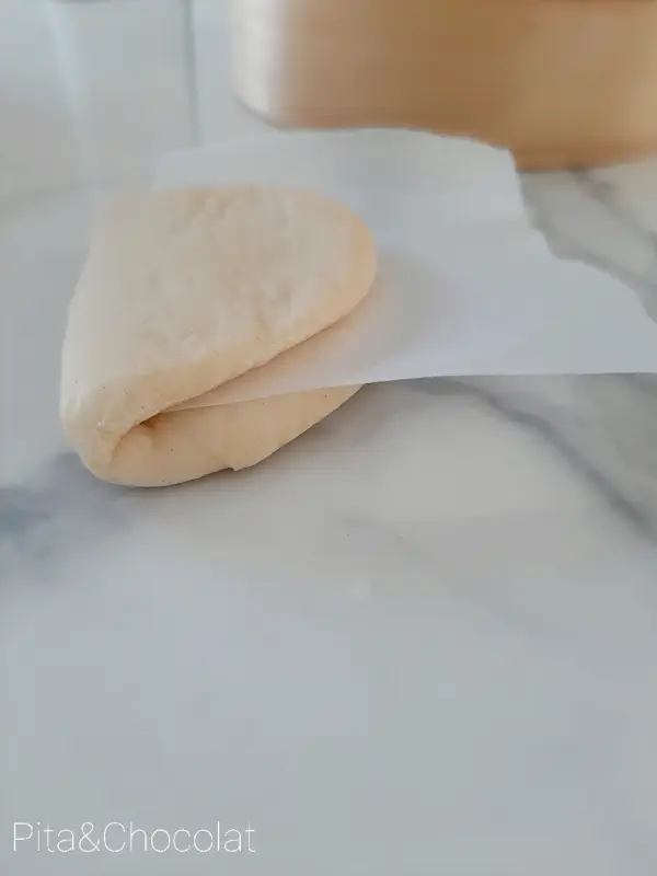 Folding steamed bao buns
