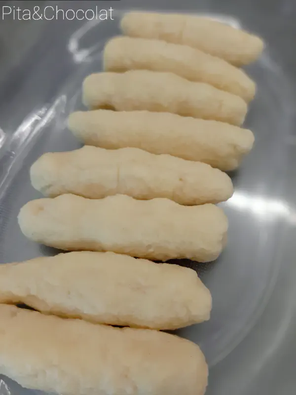 Lyonnaise quenelles au gratin with mushroom béchamel