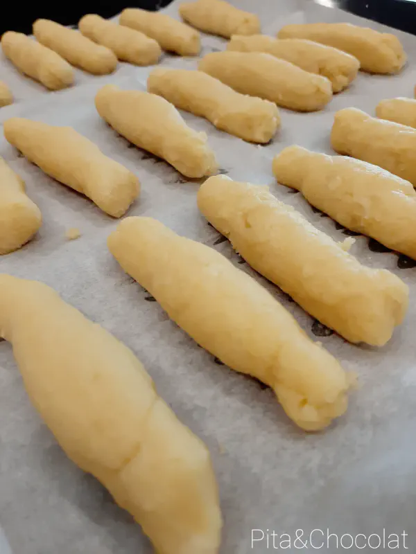 Lyonnaise quenelles au gratin with mushroom béchamel