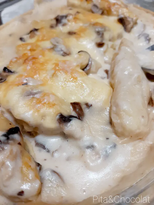 Quenelles au gratin with mushroom béchamel